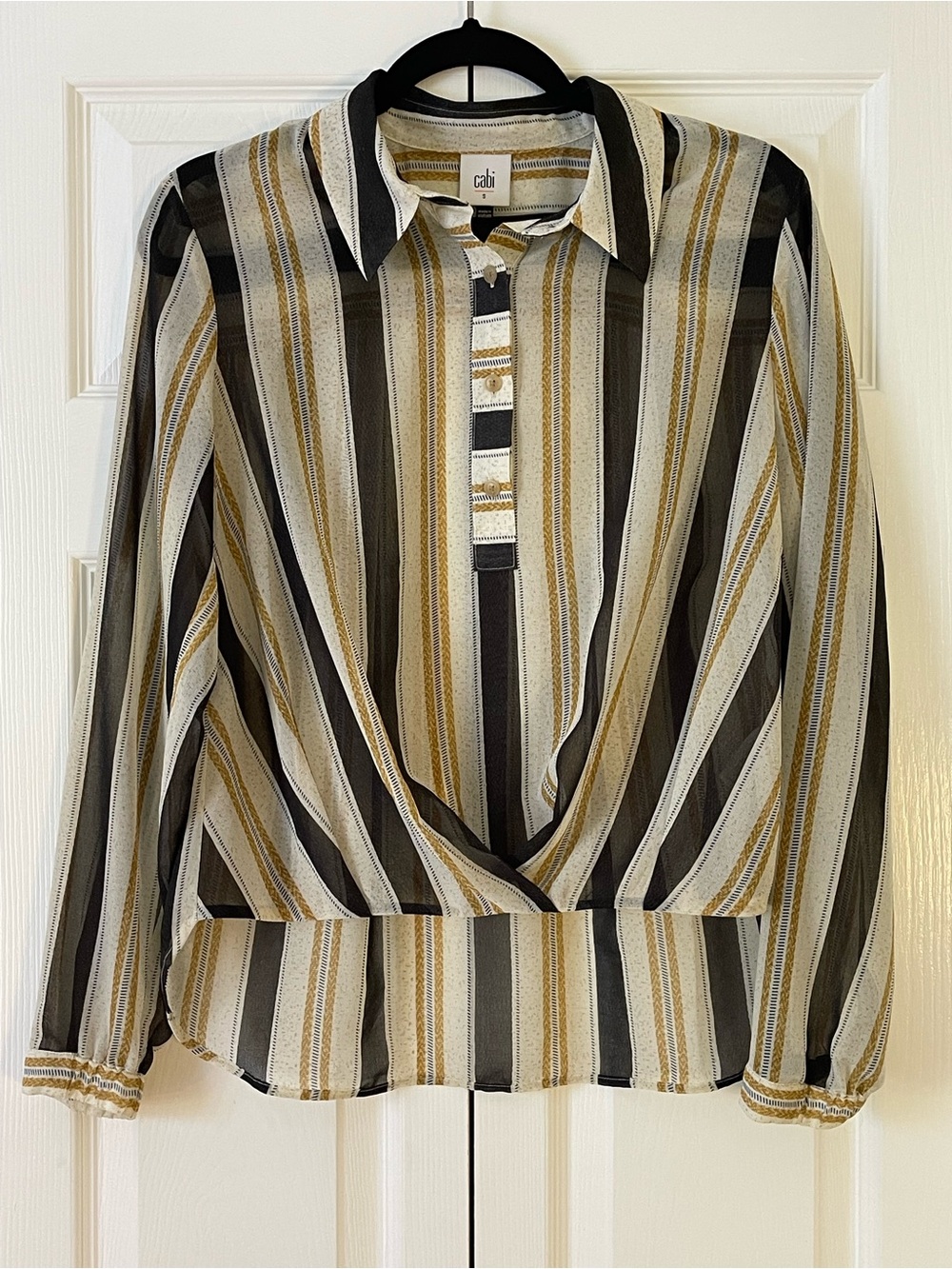 Cabi Striped Wrap Front Blouse 
Size S
Semi-Sheer
Gold, black, and blue stripes